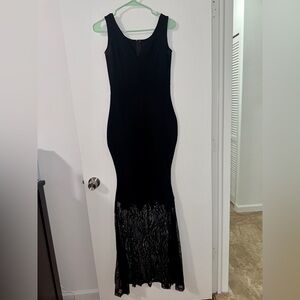 Black maxi dress with lace bottom detail.